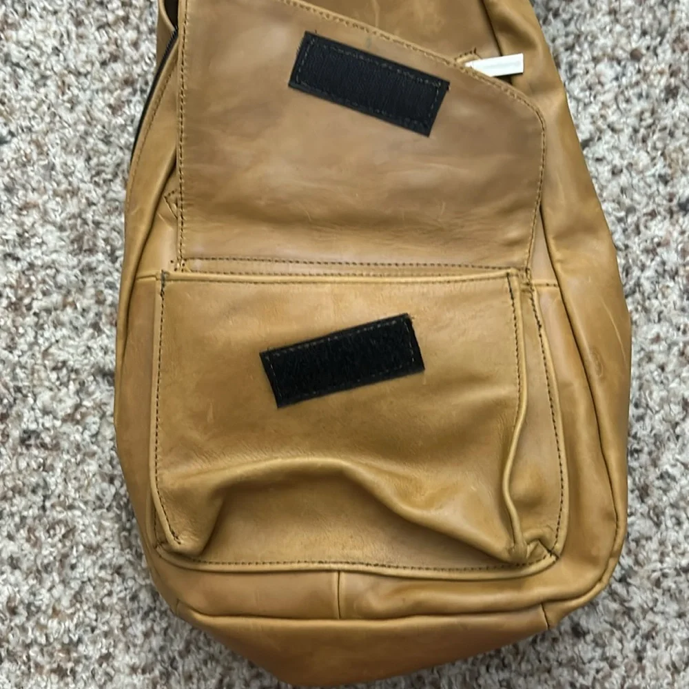 Genuine leather sling backpack